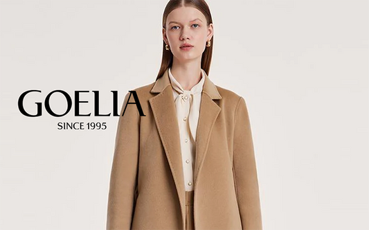 a lady in camel wool coat with beige blouse