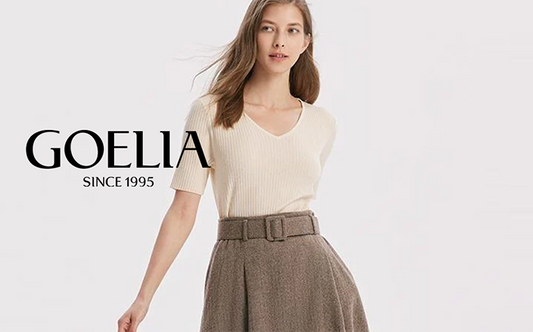 a lady in beige v-neck top with a-lined skirt