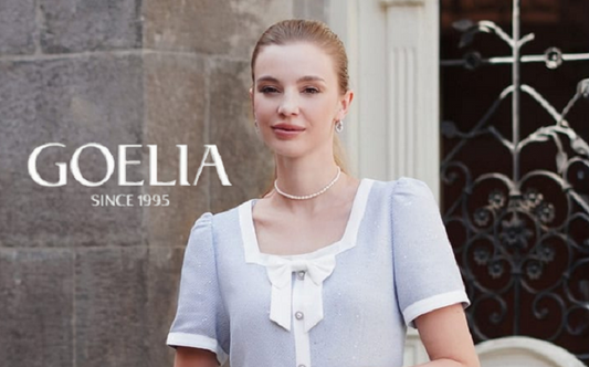 a lady in a blue acetate and tweed blend mini dress