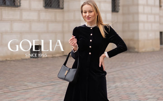 a lady in a black velvet dress