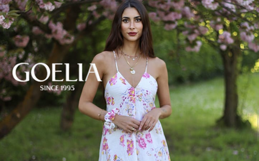 a lady in a rose printed slip dress