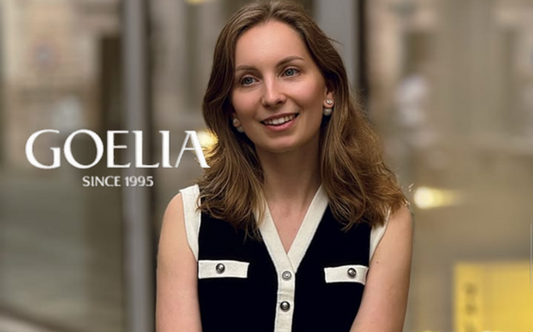 a lady in a black knit vest cardigan and a pair of tencel blend jeans