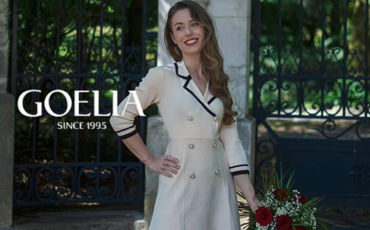 a lady in a white lapel A-line double breasted dress