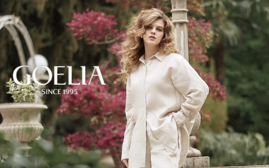 a lady in a linen oversized shirt and a pair of linen pants