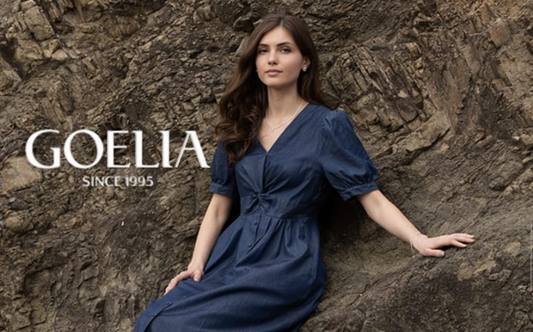 a lady in a denim twist front maxi dress