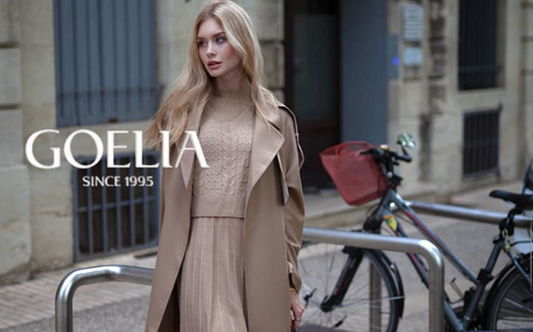 a lady in a trench coat, a sweater and a jumper dress