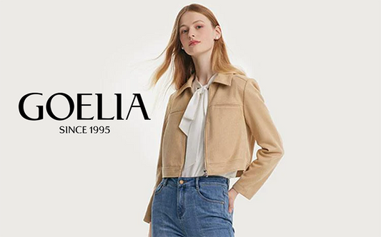 a lady in suede jacket with white blouse