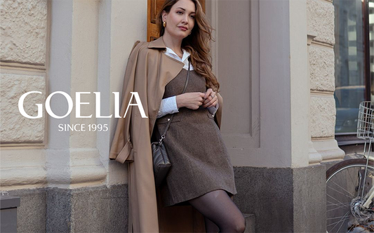 a lady in woolen tank dress with trench coat