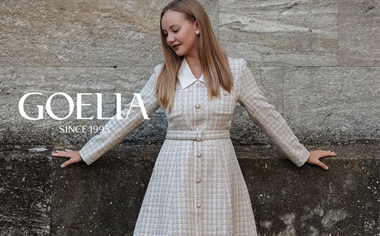a lady wears a white tweed midi dress