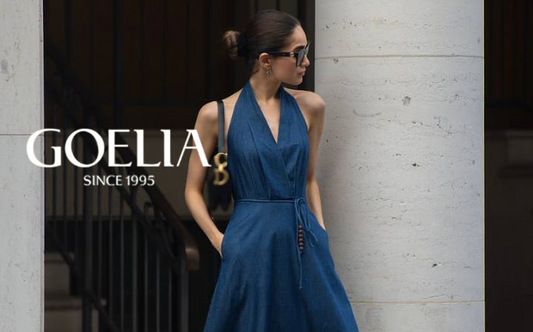 a lady in a sleeveless v-neck denim dress