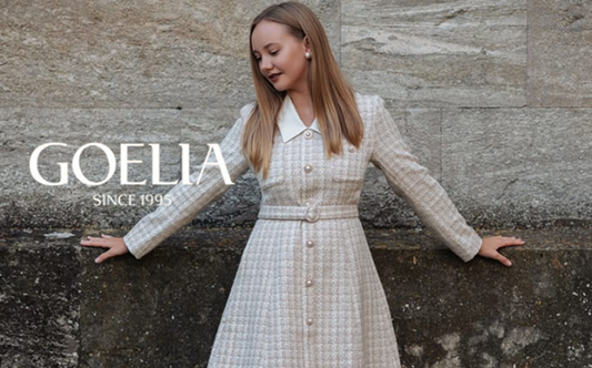 a lady in a plaid lapel wool blend tweed dress with a belt