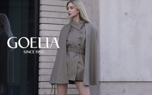 a lady in a grey wool vest and cape two-piece set