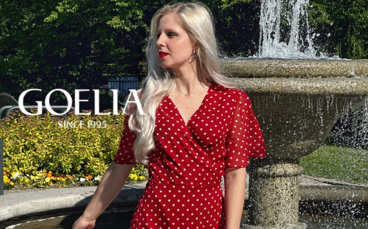 a lady in a retro styled red dress with white polka dots