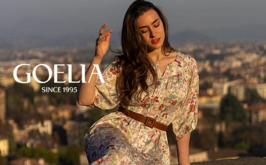 a lady in a boho styled floral printed dress with a belt