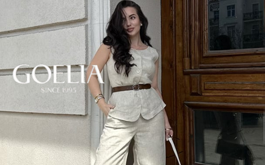 a lady in a tunic linen vest with a belt and a pair of linen pants