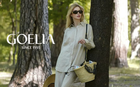 a lady in a linen oversized boyfriend shirt and a pair of linen pants