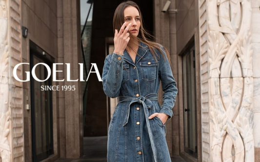 a lady in a denim lapel dress with a belt