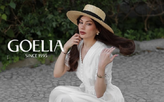 a lady in a white tencel blend lace maxi dress
