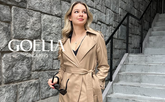 a lady in a black top and a trench coat