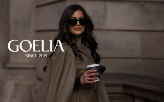 a lady in a grey wool vest and cape two piece-set