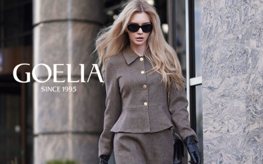 a lady in a grey wool jacket and skirt two-piece set