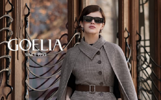 a lady in a grey washable wool check cape and vest two-piece set