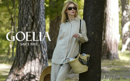 a lady in a linen shirt and a pair of linen pants