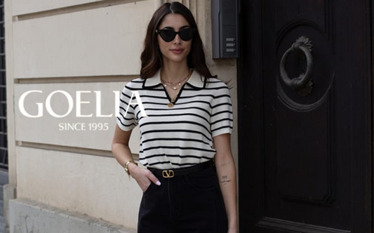 a lady in a striped lapel knit T-shirt and a pair of black jeans