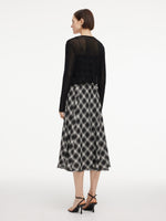 [Preview] Plaid Fringed Hem Strap Dress And Cardigan Two-Piece Set GOELIA